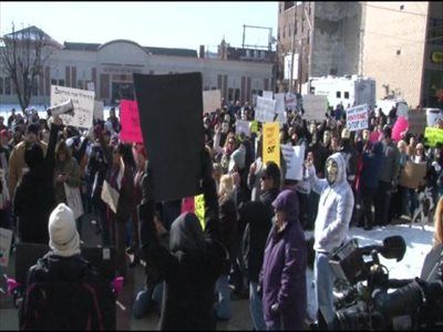 Protestors gather outside the courthouse during the rape trial.